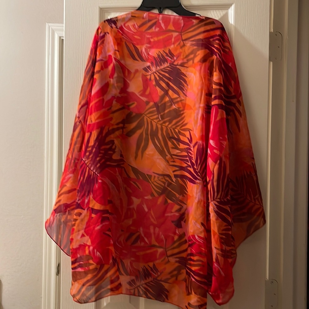 Orange you cute? On land or sea: coverup is versatile with simple cami top. 1 pc